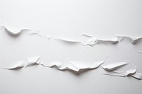 A torn strip on white paper line backgrounds abstract crumpled.