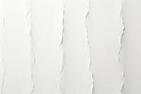 A torn strip on white paper line backgrounds textured abstract.