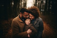 Parents Kid portrait outdoors. 