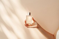 Perfume bottle cosmetics holding. AI generated Image by rawpixel.