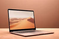 Laptop screen with desert wallpaper