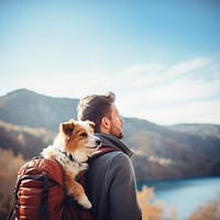 Photo of man travelling with his dog in a backpack. AI generated Image by rawpixel.