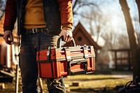 Toolbox luggage holding adult. 