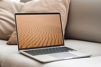 Laptop screen with desert wallpaper