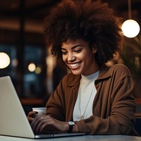 Woman using a laptop computer adult portability. 