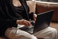 Asian woman laptop computer sitting. AI generated Image by rawpixel.