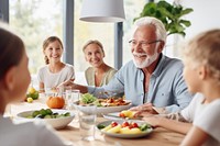 Happy multi-generation family grandfather grandchild dining. 