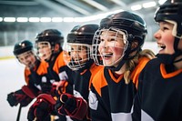 Young ice hockey players teamwork sports helmet. 