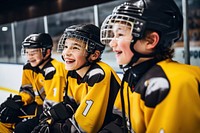 Young ice hockey players teamwork sports helmet. 