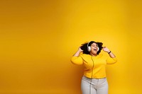 photo of a happy chubby woman wearing earphones. AI generated Image by rawpixel. 