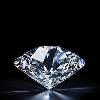 Photo of diamond, isolated on black background.  