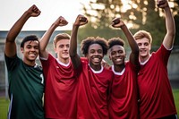 Football team cheerful teamwork standing. 