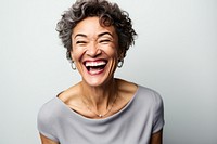 Mixed race middle age woman laughing cheerful accessories excitement. 