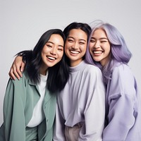 Three young asian women laughing portrait adult. 