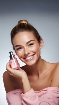 Smiling woman cosmetics perfume bottle. 