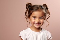 Little girl hairstyle portrait smiling. 