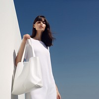 Hold white tote bag outdoors handbag adult. 