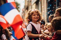 French street parade celebration child flag. 