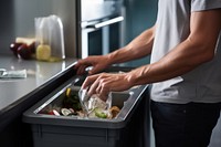 Man sorting garbage kitchen cooking adult. 