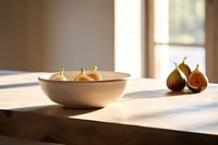 Ceramic bowl table plant fruit. 