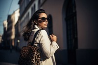 Leopard print bag city photography sunglasses. 