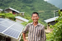 Happy asian farmer outdoors smiling smile. 