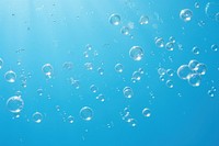 Water bubble effect, blue background 