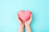 Holding heart blue pink. AI generated Image by rawpixel.