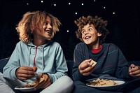 Two diversity cool kids eating snack adult food fun. 