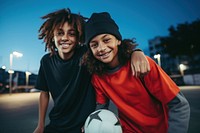 Two diversity cool kids playing sport sports photography laughing. 