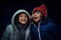 Two diversity kids crying laughing night smile. 