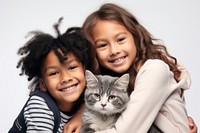 Kids hugging a cat photography portrait mammal. 