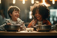 Two diversity kids having hot-pot laughing child smile. AI generated Image by rawpixel.