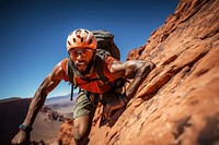 Photo of a african american hikier go rock climbing.  