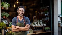 Small business owner cheerful standing smiling. 