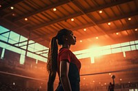 Black volleyball player women determination architecture illuminated. AI generated Image by rawpixel.