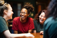 Diverse Women Volunteers talking laughing adult women. 