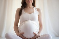 Yoga pregnant adult woman. 