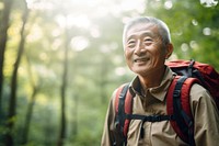 Portrait backpack forest smile. 