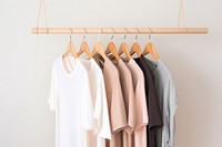 Indoors rack coathanger outerwear. AI generated Image by rawpixel.