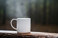 Mug on log coffee drink cup.