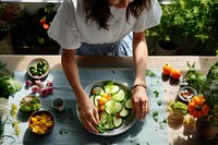 Woman eating salad vegetable cooking fruit. AI generated Image by rawpixel.