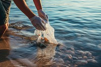 Plastic bags outdoors nature glove. AI generated Image by rawpixel.