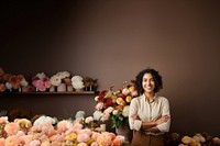 photo of a smiling florist looking at the camera studio shot isolated on a solid background.  