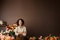 photo of a smiling florist looking at the camera studio shot isolated on a solid background.  