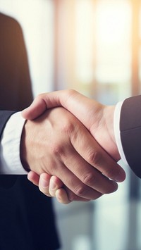Business men handshake office person. AI generated Image by rawpixel.