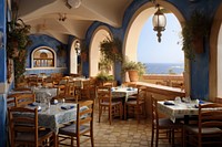 A mediterranean restaurant architecture furniture building. 