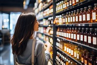 Looking store shelf adult. 