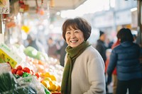 Japanese housewife shopping market adult smile. 