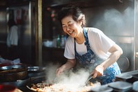 Aunt cooking food adult concentration. 